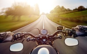 Atlanta motorcycle accident lawyer- point of view of motorcycle driver on an open road